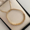 Pulsera tejida Cilindros Diamantados Hilo Beige Oro amarillo 18k 2 Gr