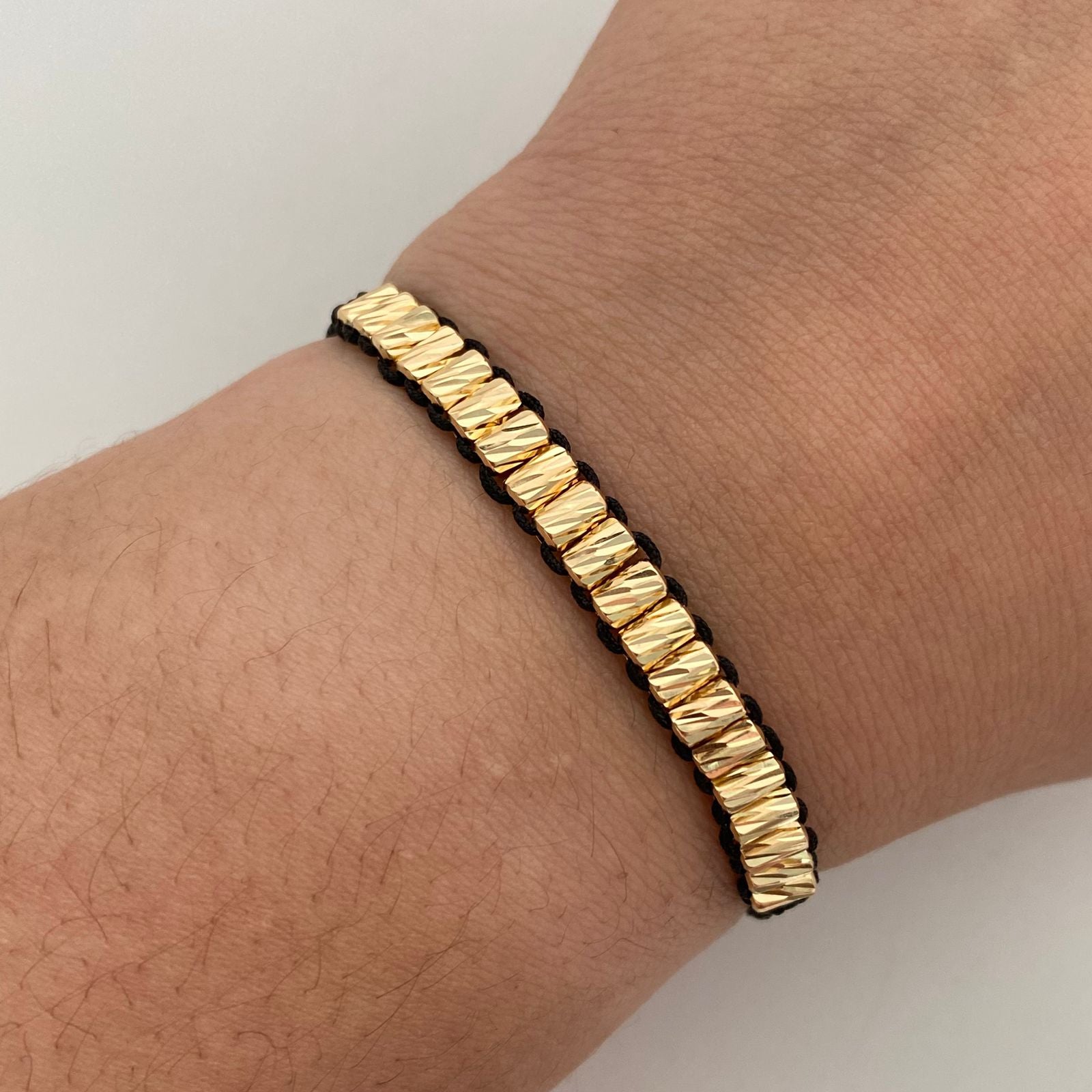 Pulsera tejida Cilindros Diamantados Hilo Negro Oro amarillo 18k 2 Gr