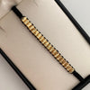 Pulsera tejida Cilindros Diamantados Hilo Negro Oro amarillo 18k 2 Gr