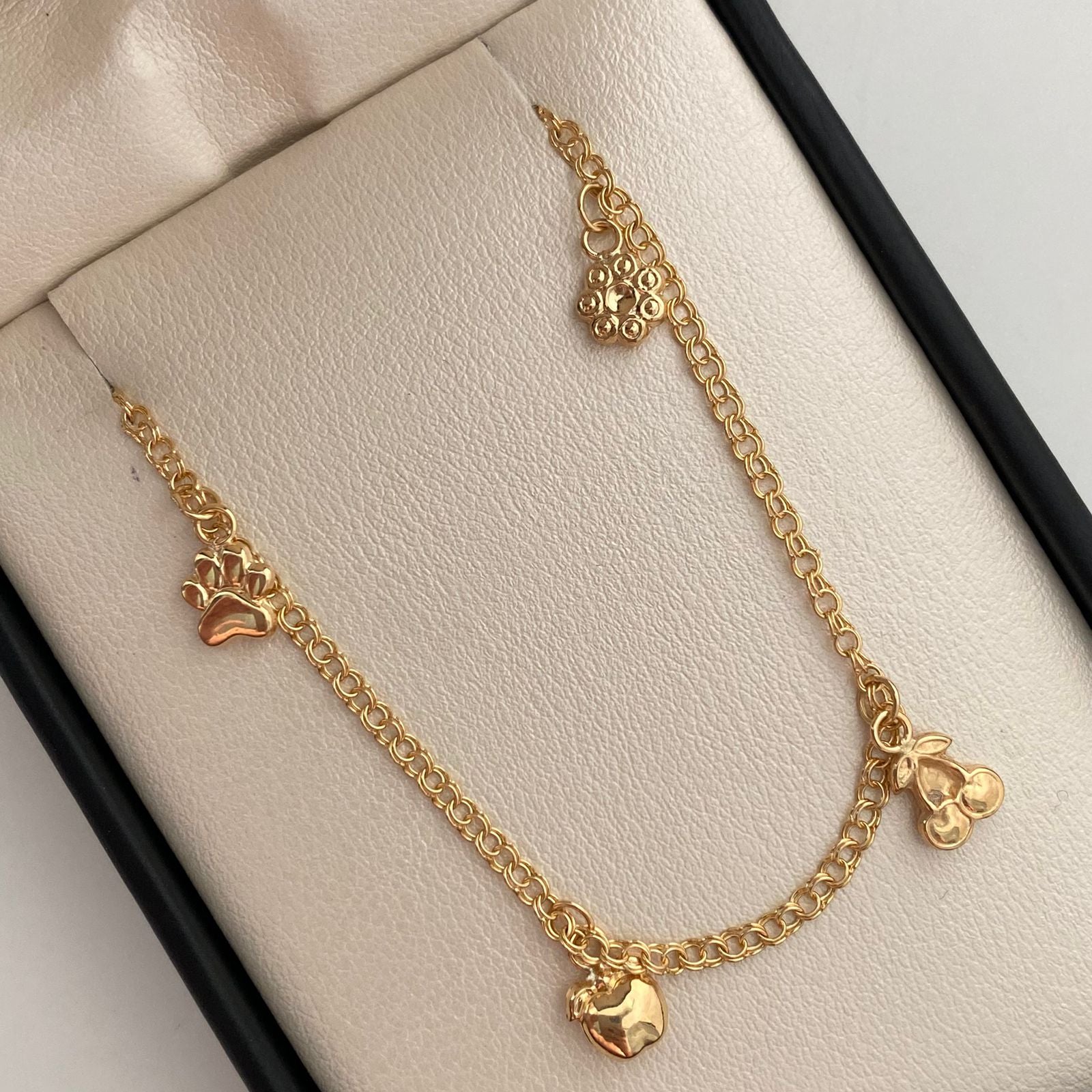 Tobillera Aro seguido dijes frutas Oro amarillo 18k 3,85 Gr / 2,3 mm / 25,7 Cm Broche 0,30