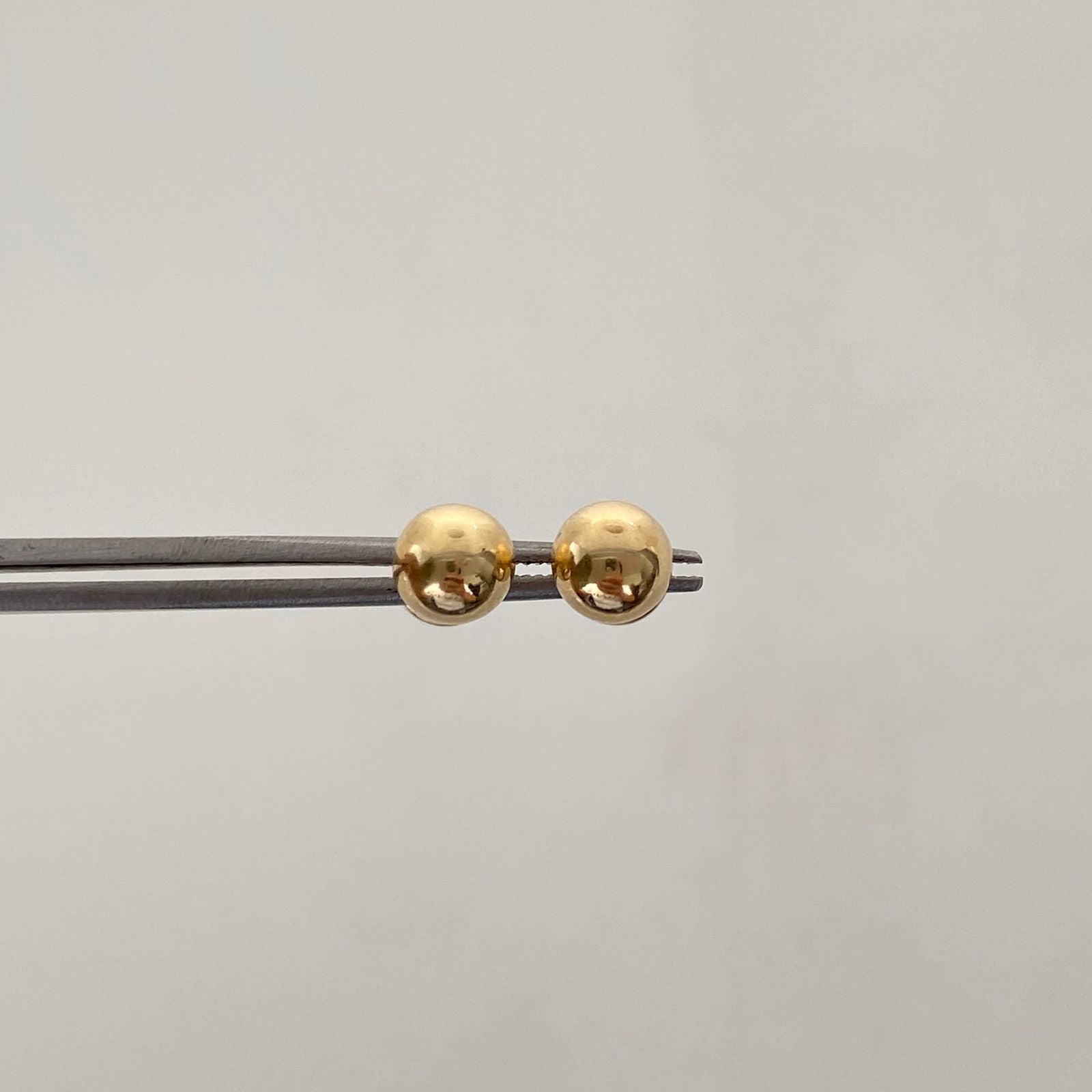 Topos Bola lisa 6mm Oro amarillo 18k 0,65 Gr