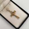 Dije cruz con cristo y circones blancos y azules  Oro amarillo 18k 10,95 Gr / 2,28 mm / 5,6 Cm