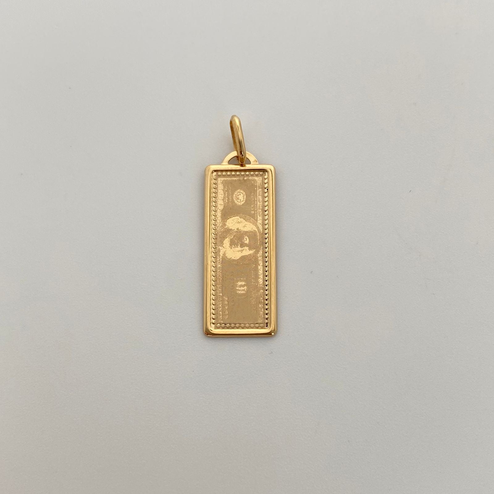 Dije It Dolar Oro amarillo 18k +4 / 1,1 Gr / 9,5 mm / 3 Cm