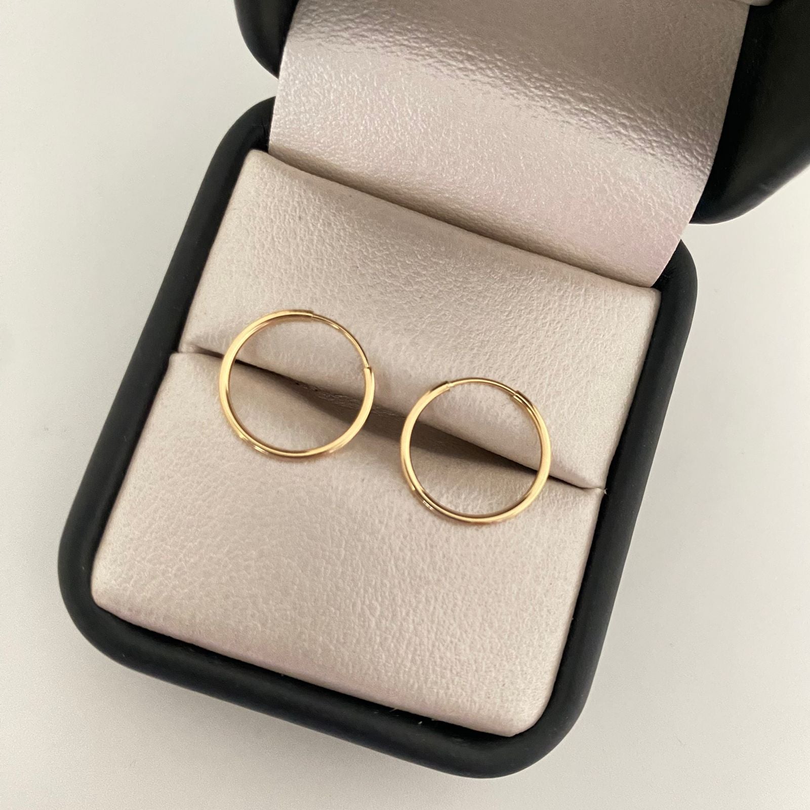 Candonga imperdible lisa Oro amarillo 18k 0,70 Gr / 1,5 Cm