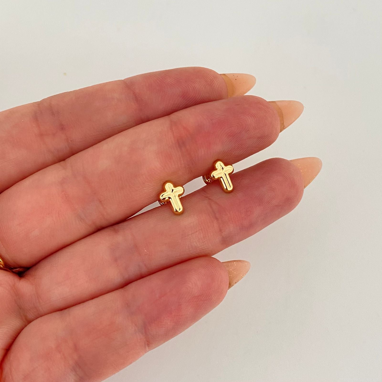 Topos cruz en medio relieve  Oro amarillo 18k 0,6 Gr / 5,6 mm