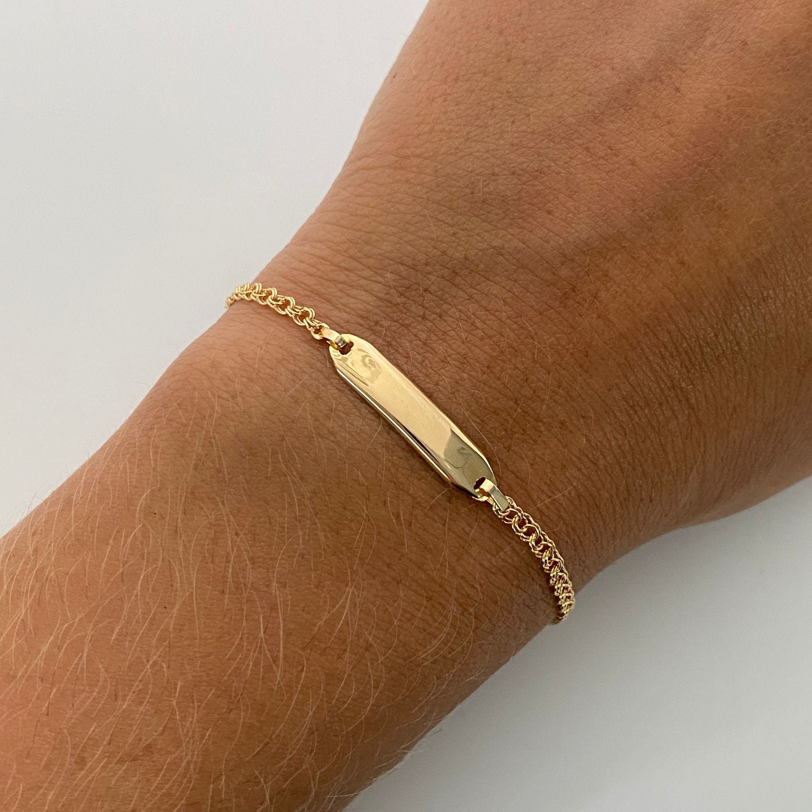 Pulso bebé aro seguido placa biselada  Oro amarillo 18k 1,50 Gr / 4,7 mm / 16 Cm Broche 0,15