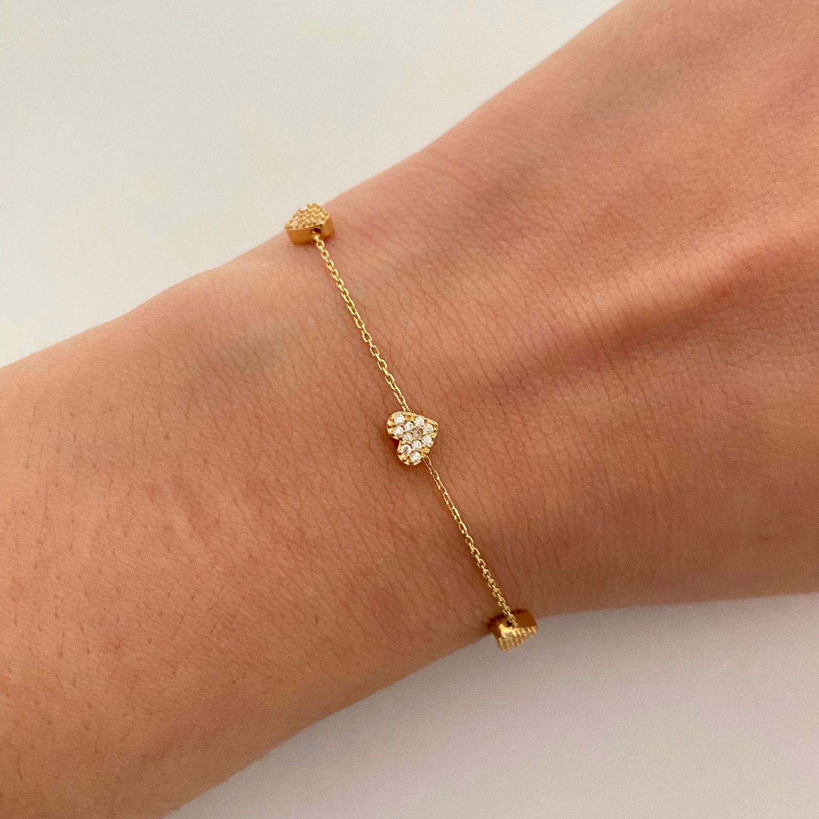 Pulso It de corazones con circones blancos graduable  Oro amarillo 18k +4 / 2,2 Gr / 0,8 mm / 17 Cm