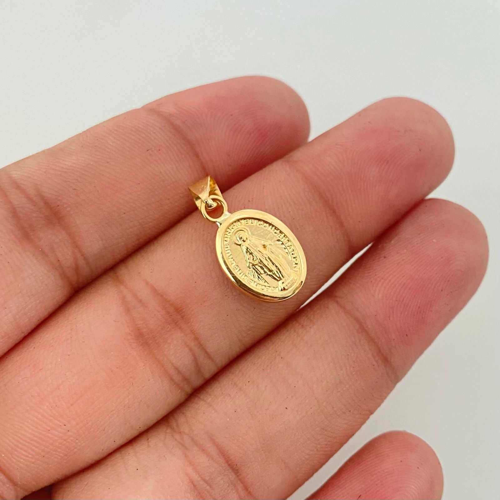Dije virgen milagrosa Oro amarillo 18k 0,65 Gr / 2,0 Cm