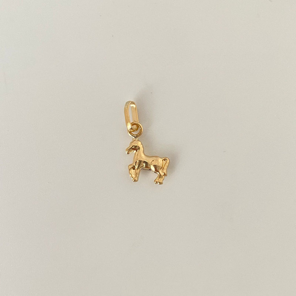 Dije mini caballo Oro amarillo 18k 0,55 Gr / 1,7 Cm