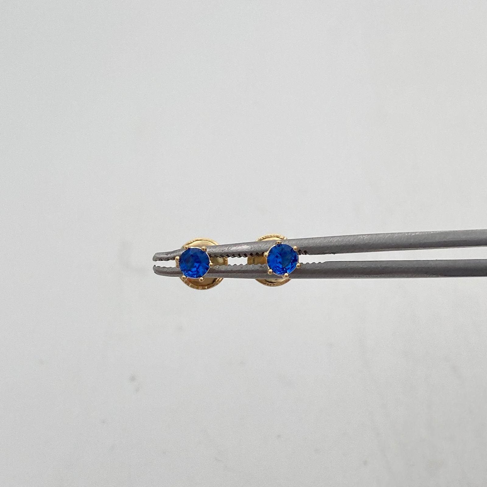 Topos circon azul oscuro  Oro amarillo 18k 0,5 Gr / 3,76 mm