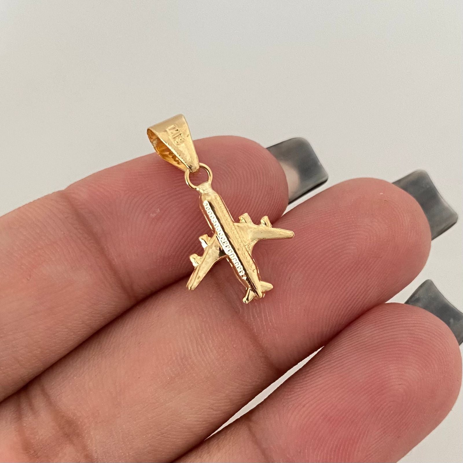 Dije avión Oro amarillo 18k 0,6 Gr / 2,0 Cm