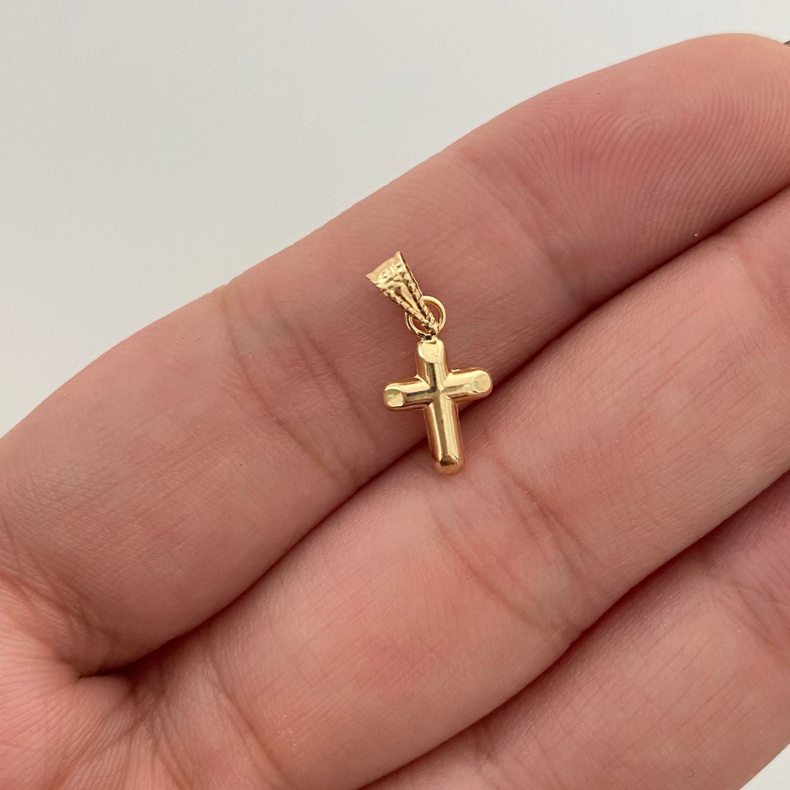 Dije Cruz Oro amarillo 18k 0,3 Gr / 7,3 mm / 1,5 Cm