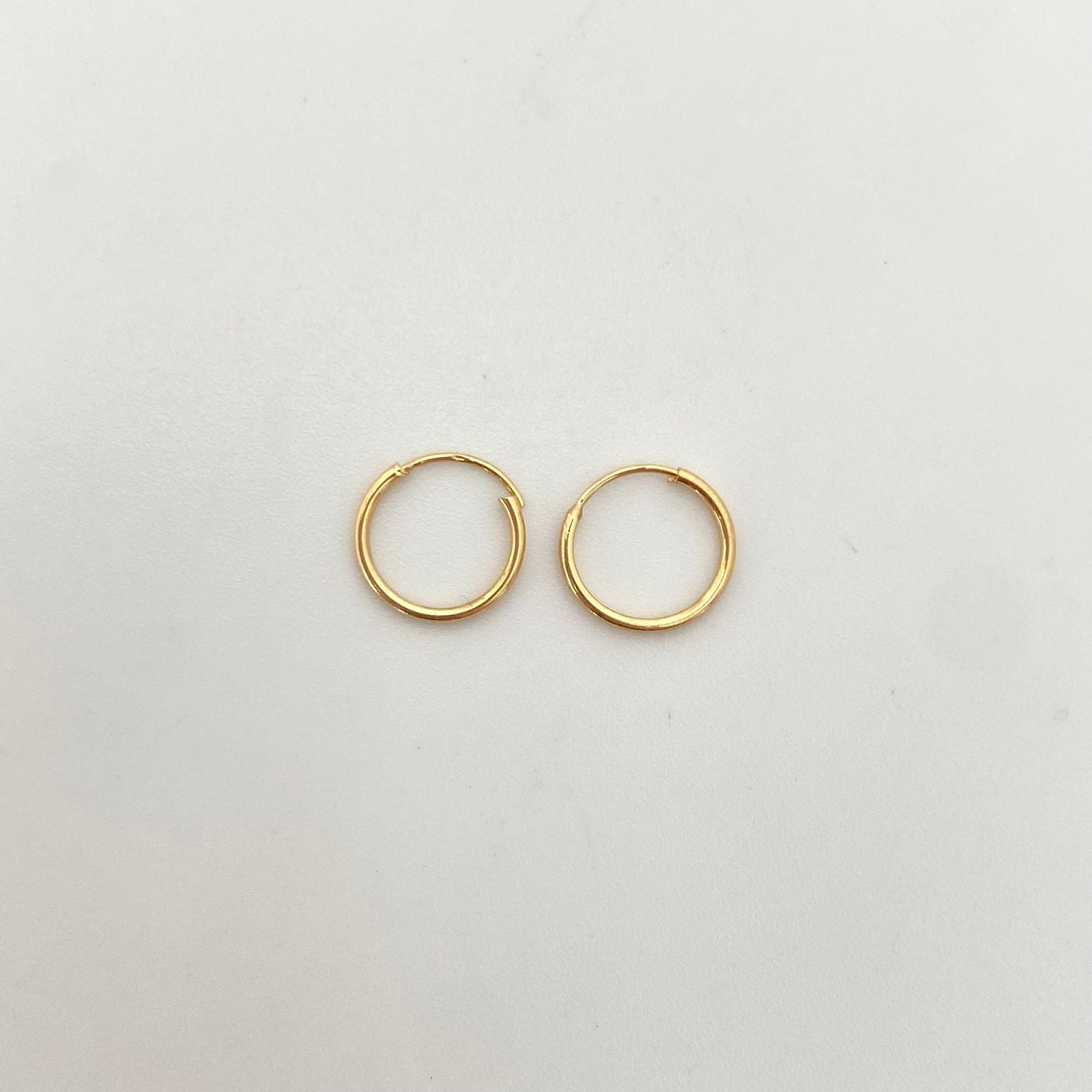 Candonga imperdible lisa Oro amarillo 18k 0,4 Gr / 1,1 Cm