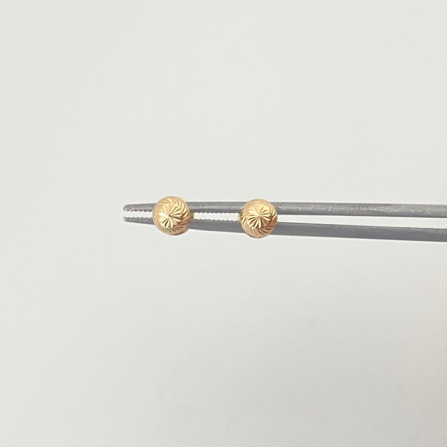Topos bola diamantada Oro amarillo 18k 0,60 Gr / 5,0 mm