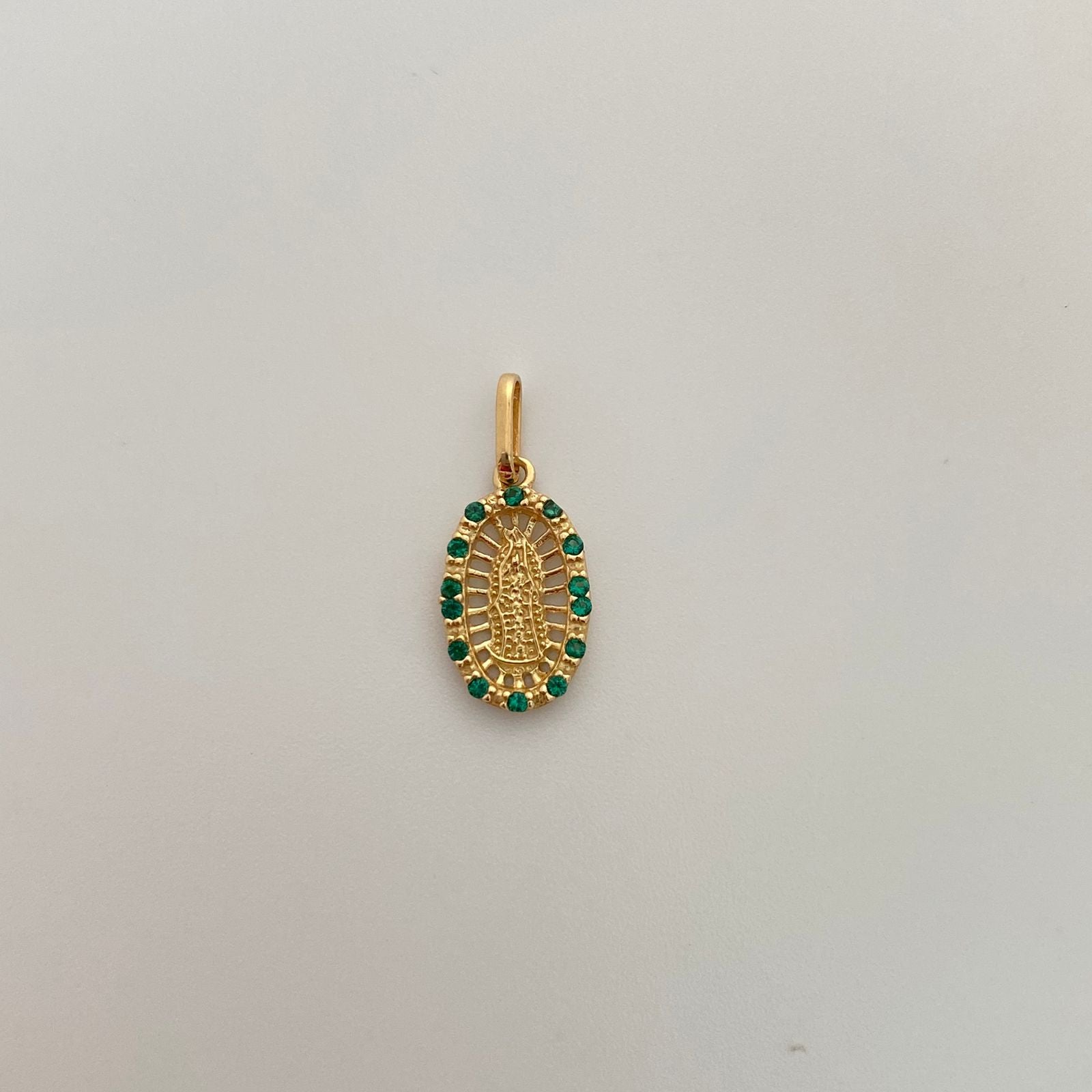 Dije Guadalupe ovalada casting verde Oro amarillo 18k 1,25 Gr / 9,2 mm / 2 Cm