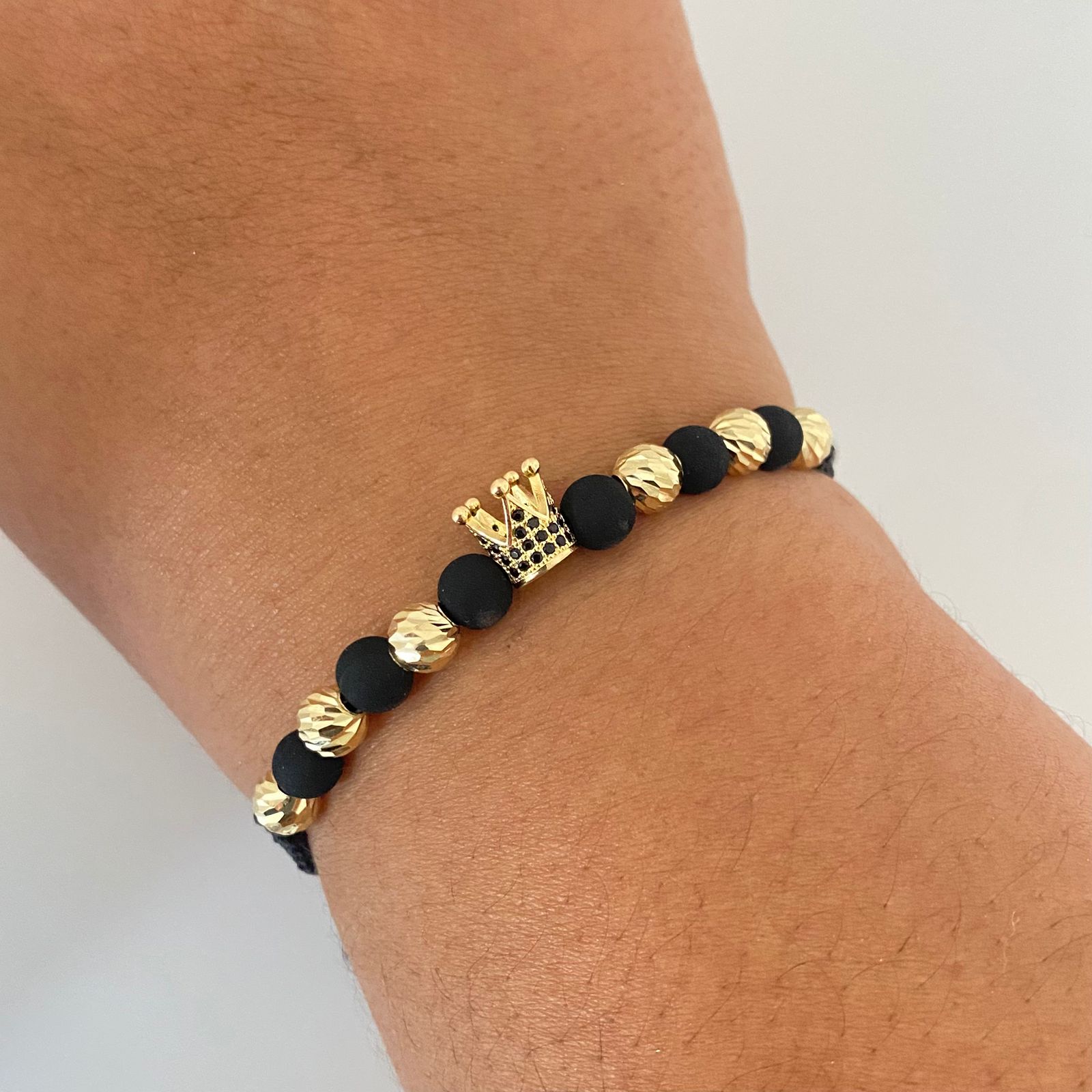 Pulsera tejida corona casting negro con balines #6 diamantados Oro amarillo 18k 2,35 Gr
