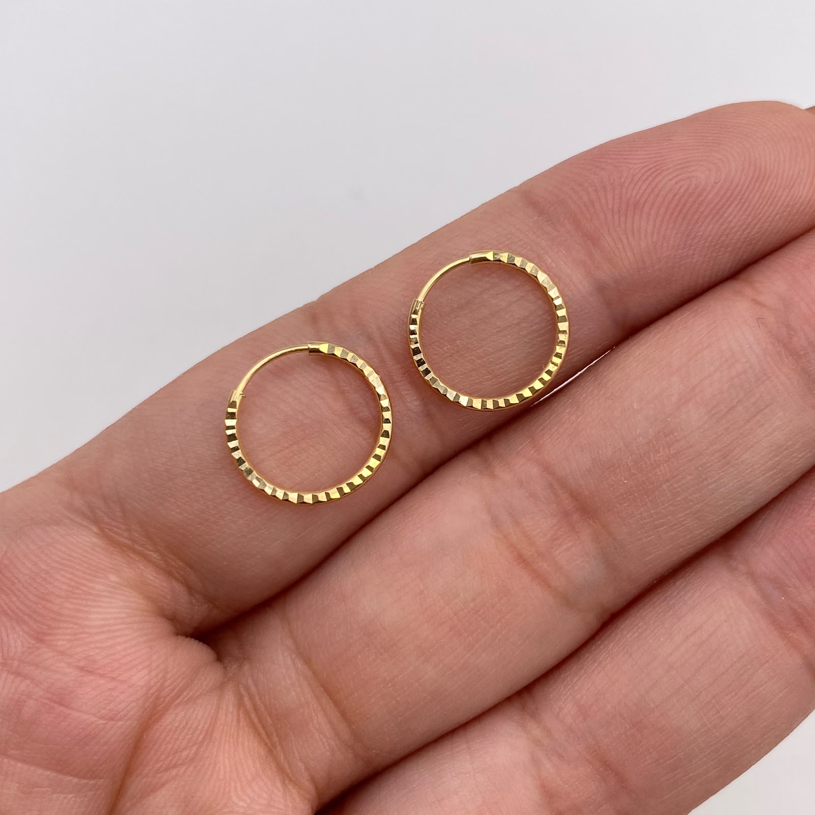 Candonga imperdible diamantada Oro amarillo 18k 0,59 Gr / 1,2 Cm
