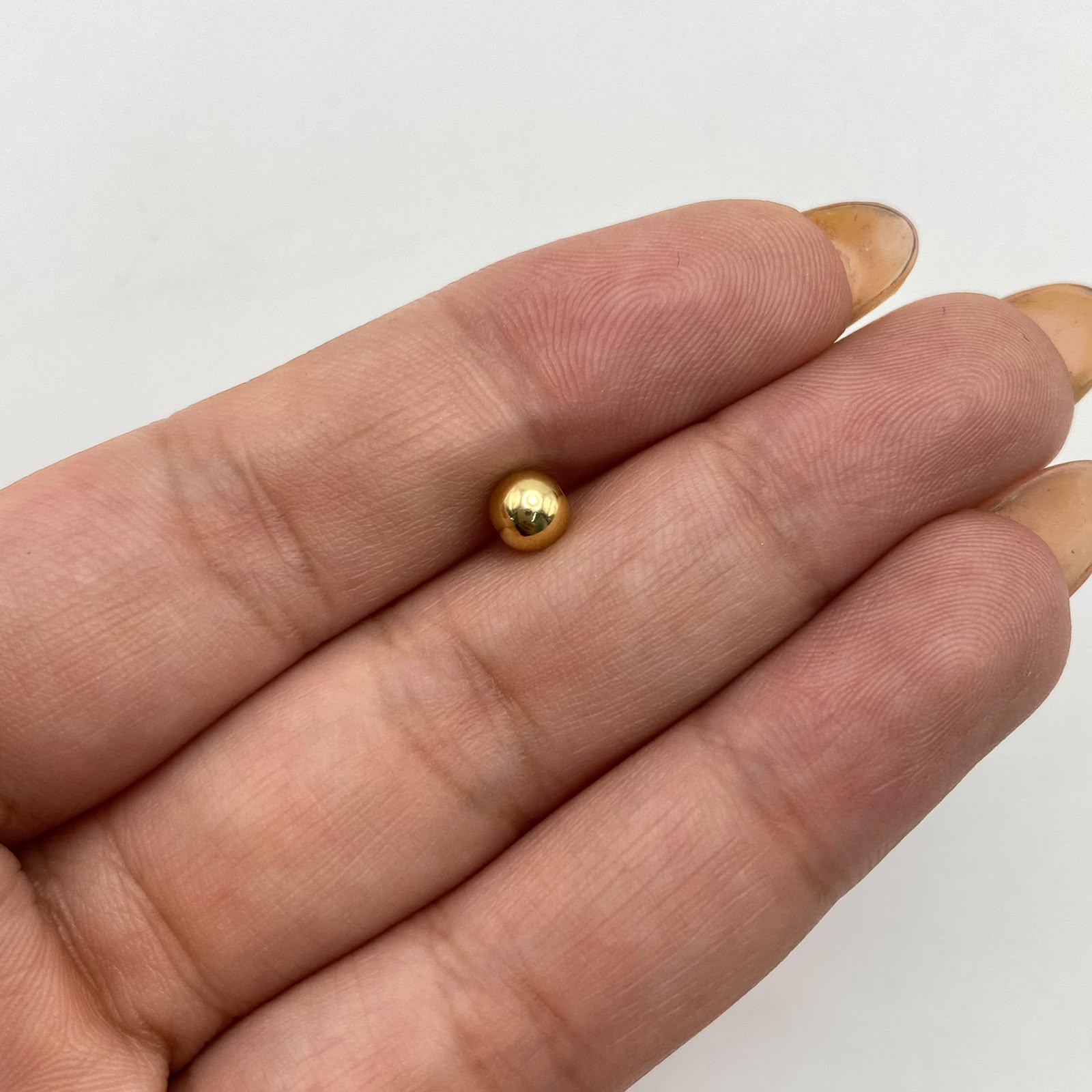 Bola Lisa 5mm Oro amarillo 18k 0,15 Gr