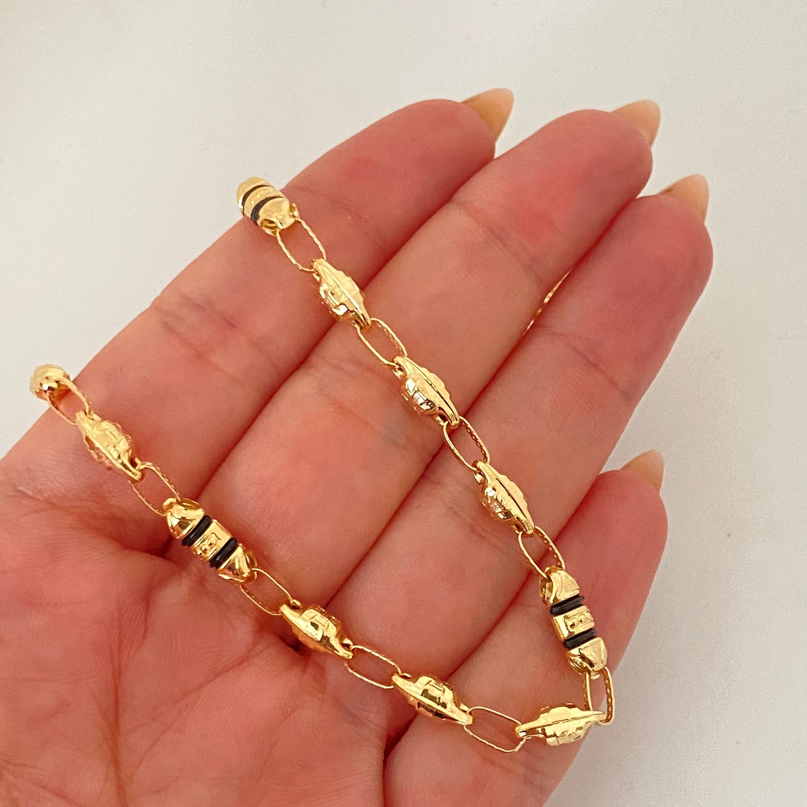 Cadena rustica diamantada con cauchos negros  Oro amarillo 18k 12,80 Gr / 62 Cm  Broche 0,60