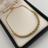 Pulso It Esmeraldas redonda (por fabricacion) Sujeta a disponibilidad Oro amarillo 18k +3 / 8,4 Gr / 21 Cm