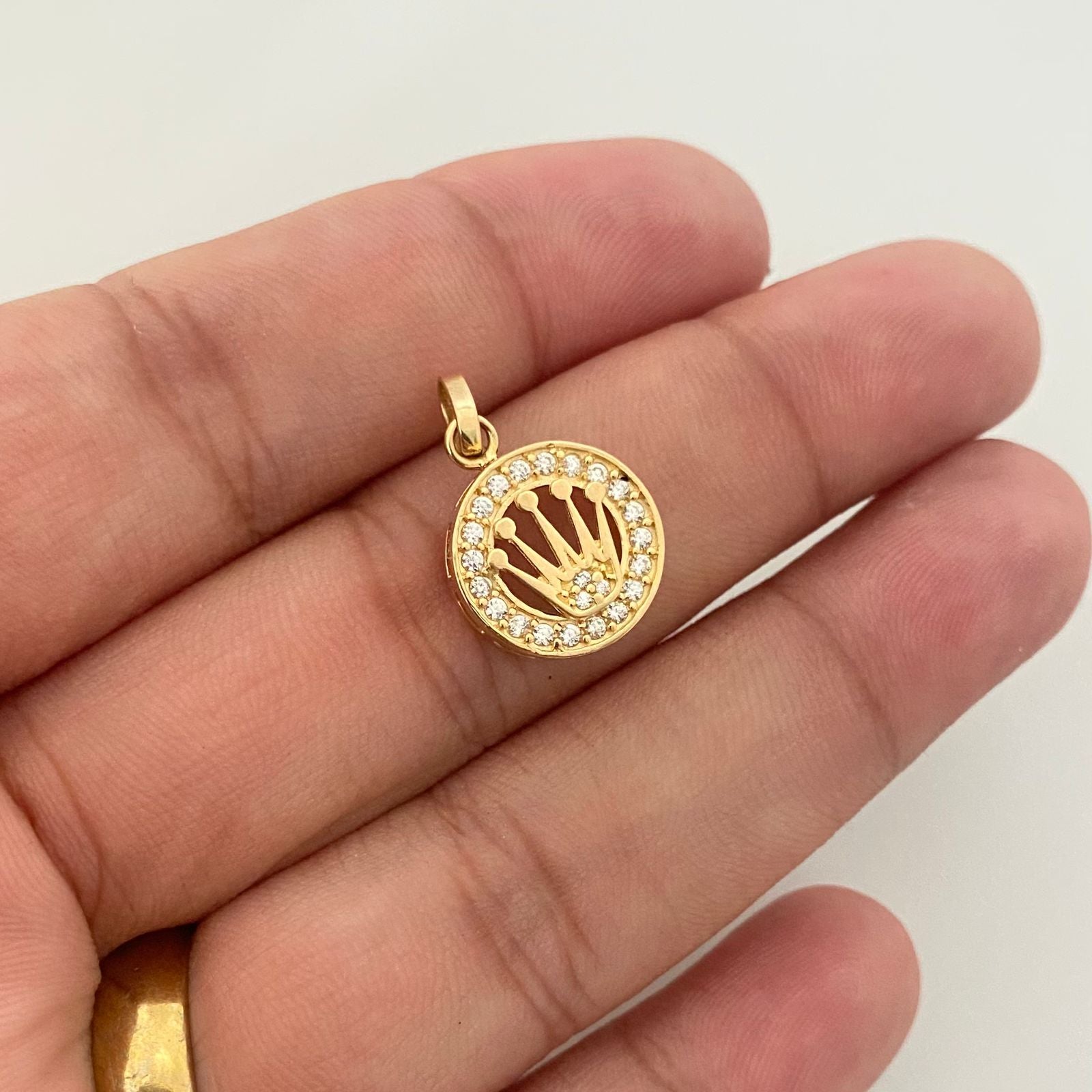 Dije silueta corona rx borde casting Oro amarillo 18k 2,15 Gr / 2,0 Cm