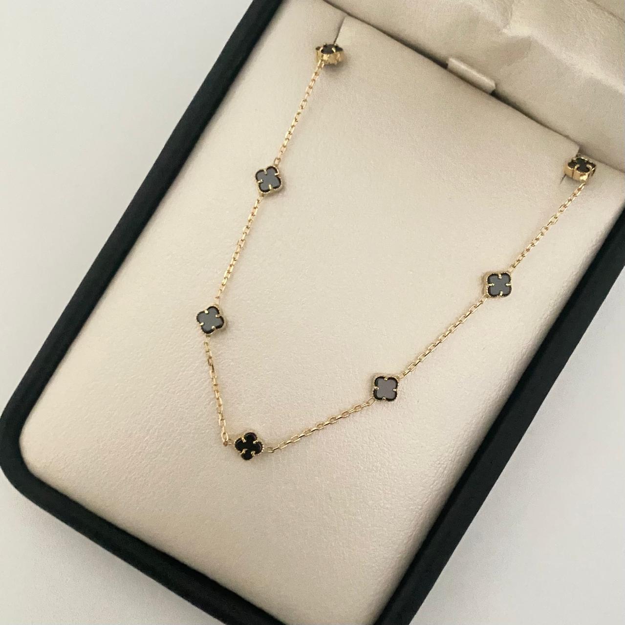 Pulso It trebol mini fondo negro Oro amarillo 18k +4 / 2,35 Gr / 4,6 mm / 19,5 Cm