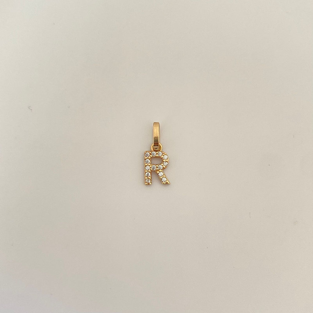 Dije letra R casting Oro amarillo 18k 0,55 Gr / 1,5 Cm