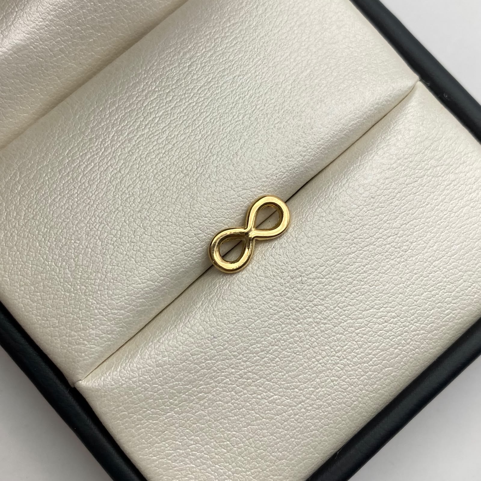 Herraje infinito Oro amarillo 18k 0,45 Gr / 1,5 Cm