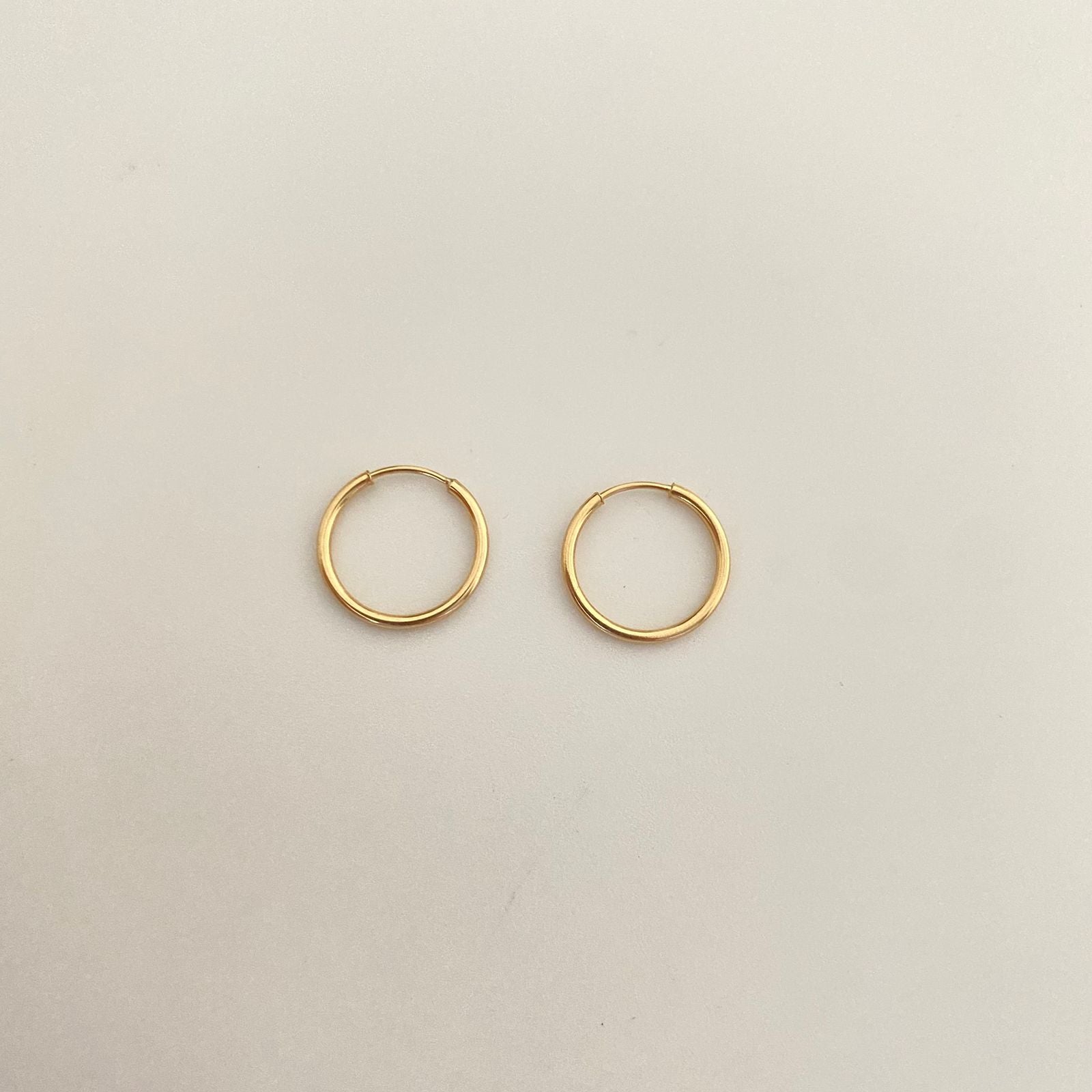 Candonga imperdible lisa Oro amarillo 18k 0,55 Gr / 1,3 Cm