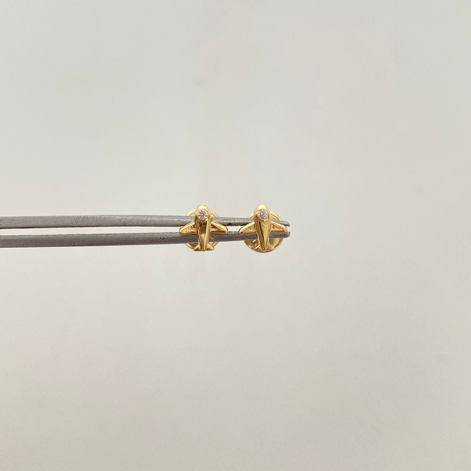Topos avion circon blanco  Oro amarillo 18k 0,6 Gr / 5,5 mm
