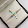 Dije cruz circones verde agua Oro amarillo 18k 1,35 Gr / 15,74 mm / 3 Cm