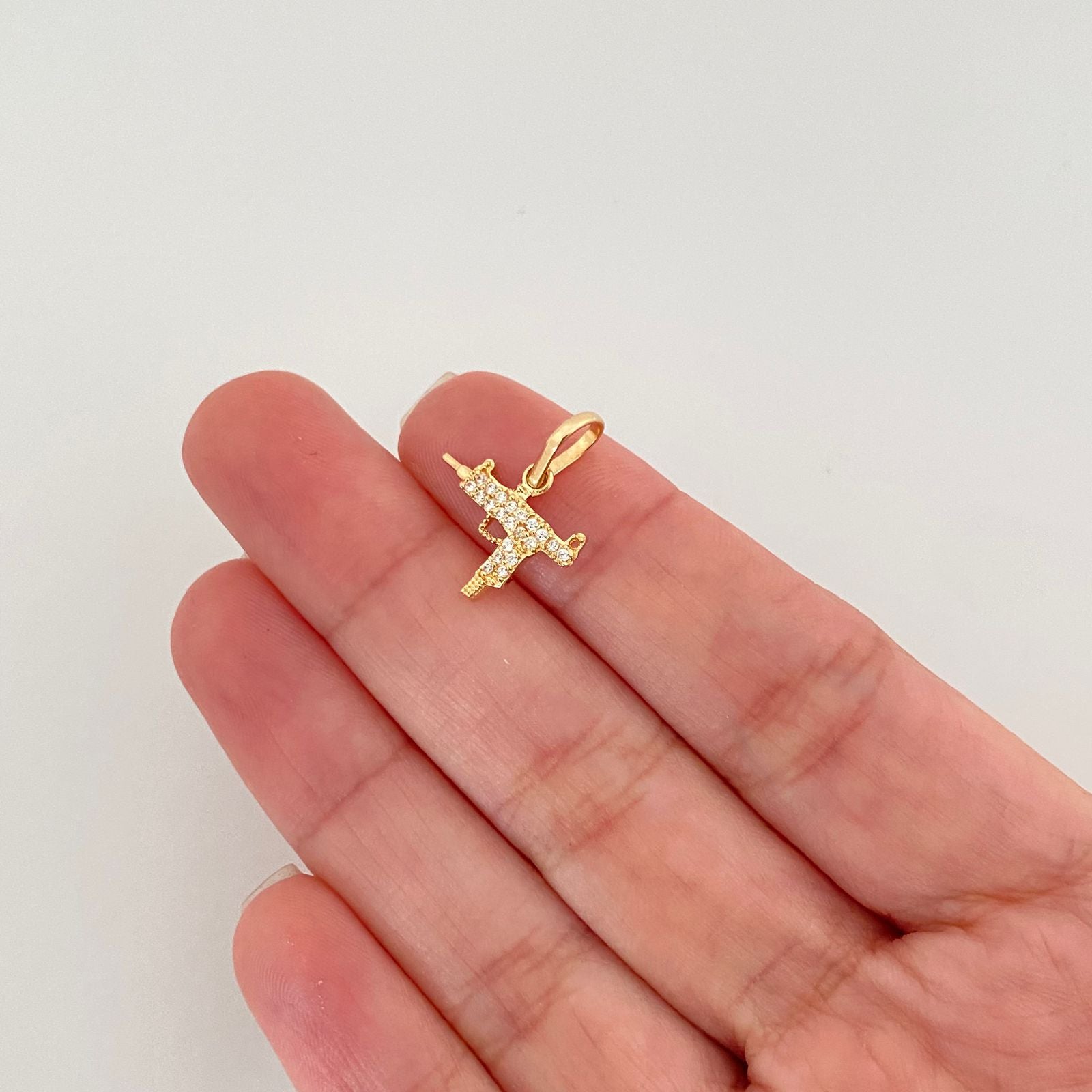 Dije arma casting Oro amarillo 18k 0,90 Gr / 1,50 Cm