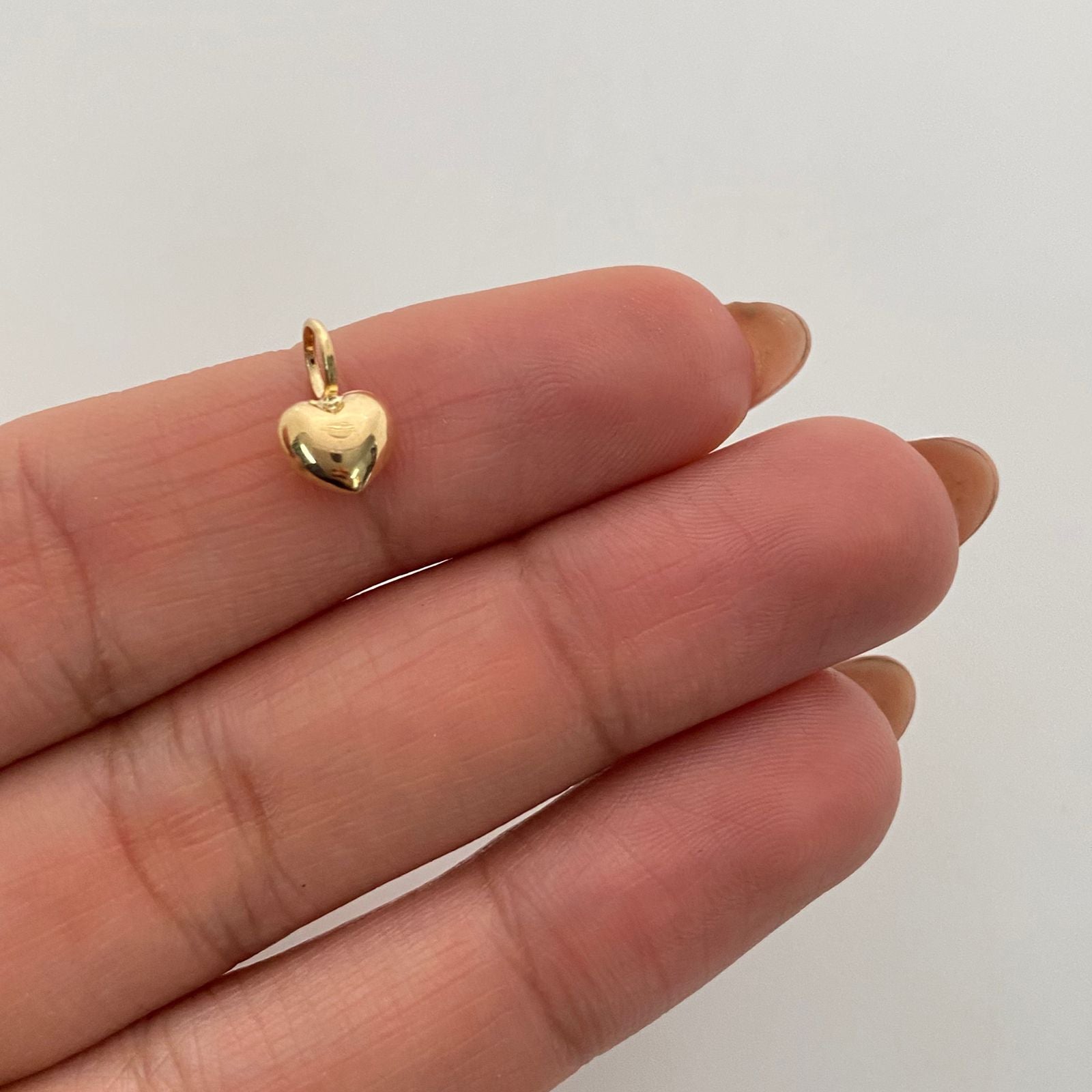 Dije Corazon Inflado Oro amarillo 18k 0,3 Gr / 6,4 mm / 1 Cm