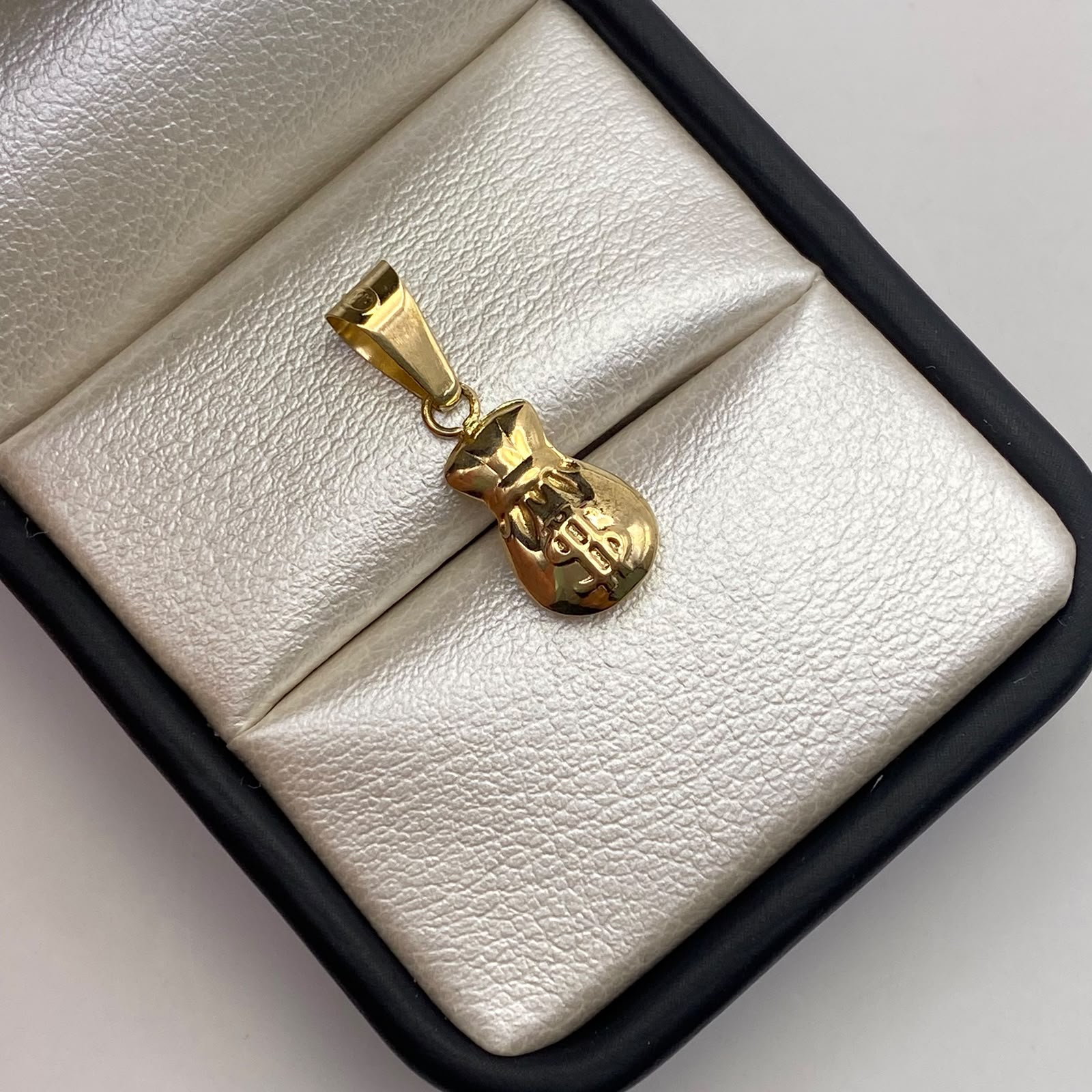 Dije Bolsa de valores Oro amarillo 18k 0,71 Gr / 8,2 mm / 2,3 Cm