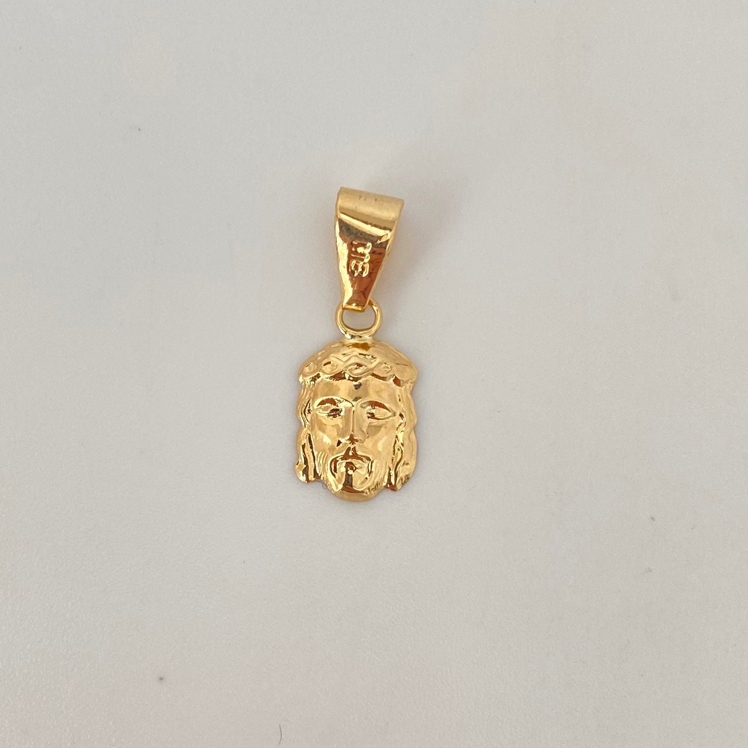 Dije rostro jesus  Oro amarillo 18k 0,55 Gr / 2 Cm