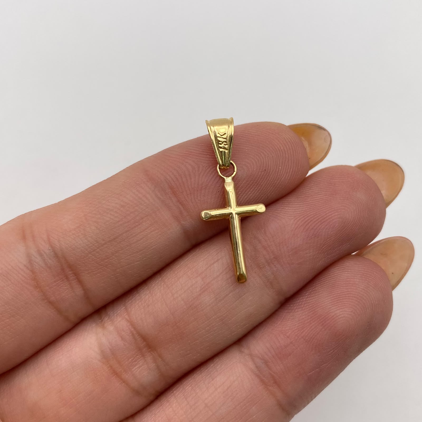 Dije cruz lisa Oro amarillo 18k 0,4 Gr / 9,5 mm / 2,5 Cm