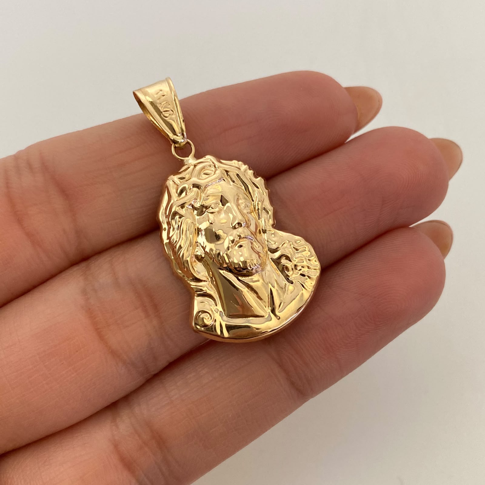 Dije Rostro Oro amarillo 18k 2,2 Gr / 17,9 mm / 3,4 Cm