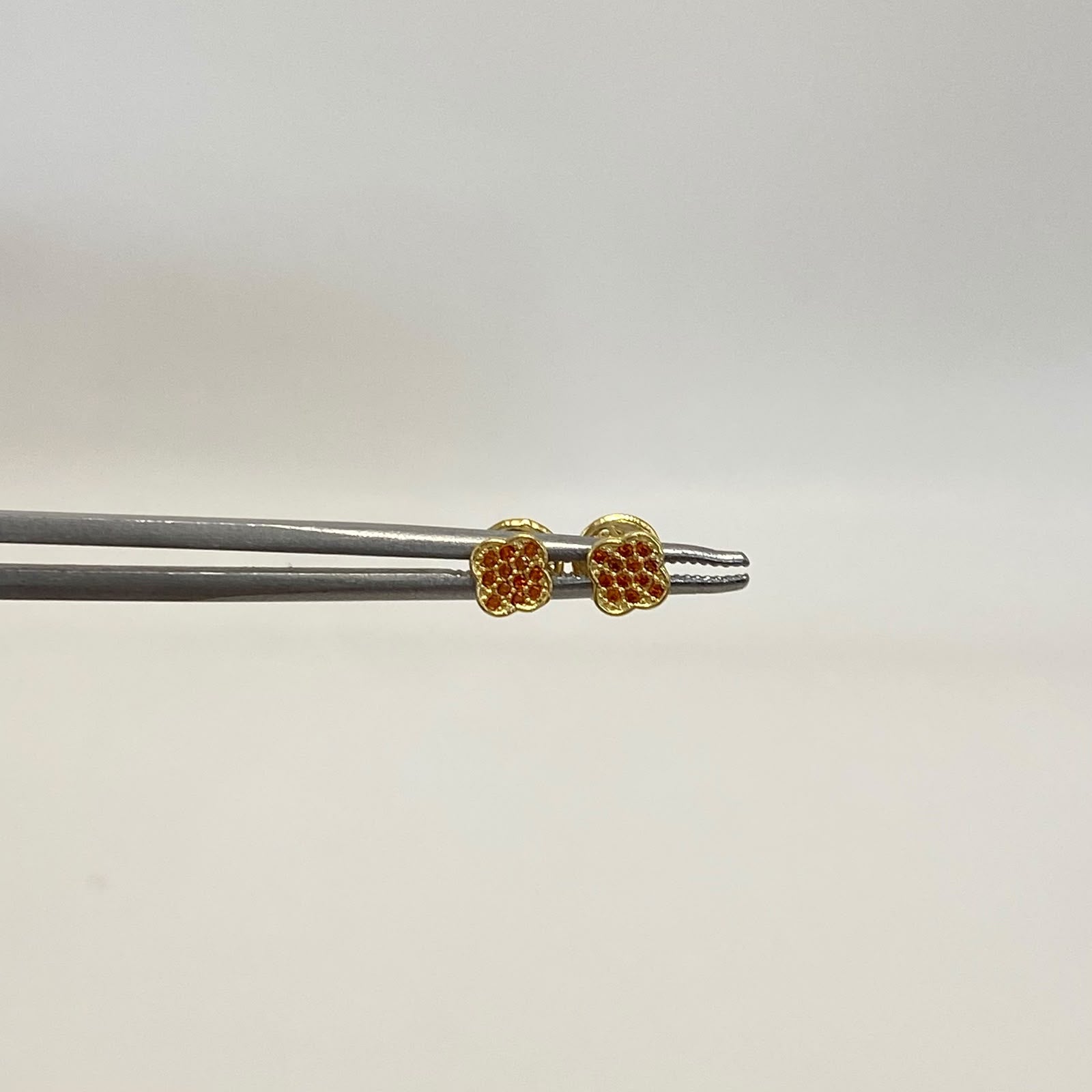 Topos trebol circón naranjado Oro amarillo 18k 0,65 Gr / 5,1 mm