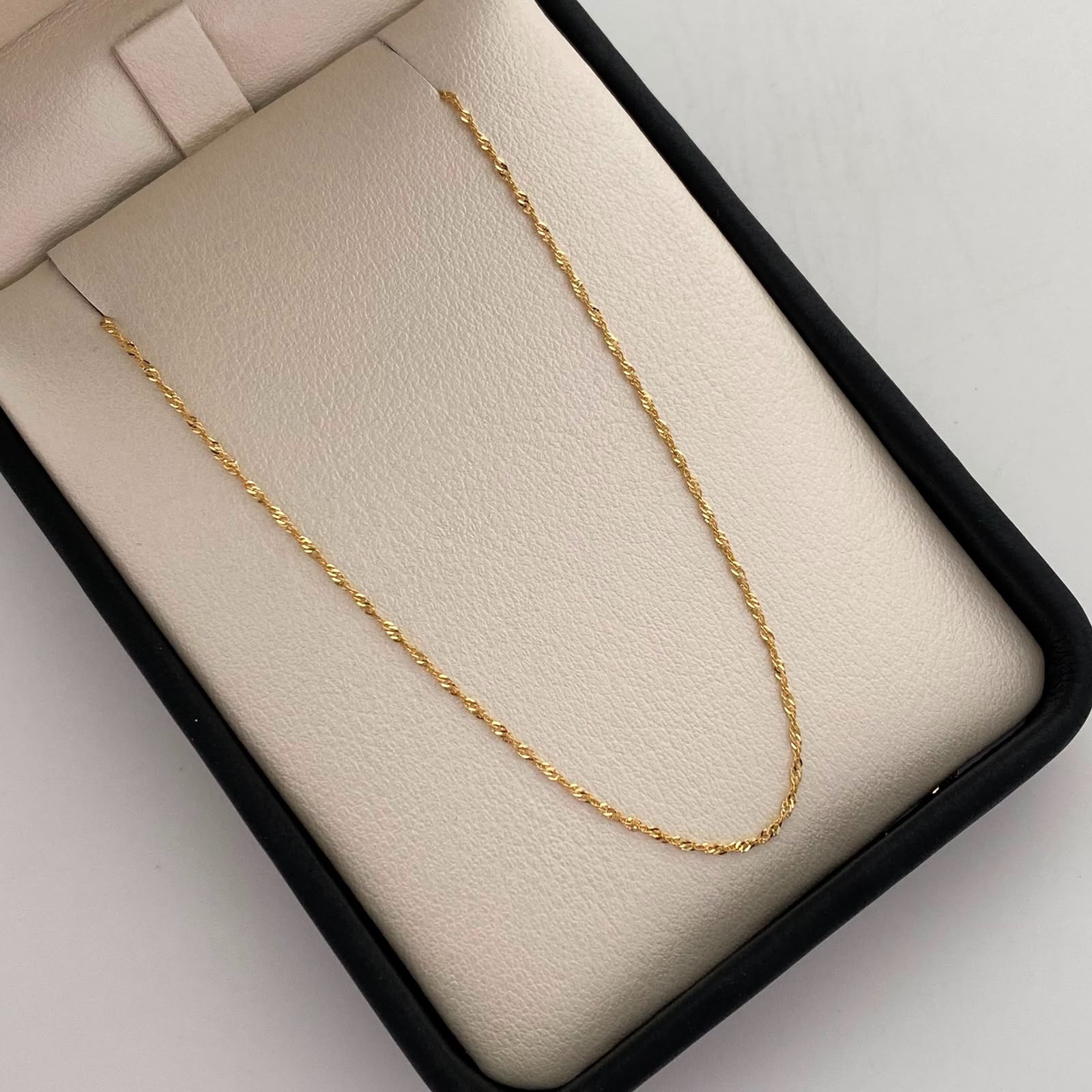Cadena It Mini Singapur Oro amarillo 18k +1 / 1,3 Gr / 1,2 mm / 50 Cm