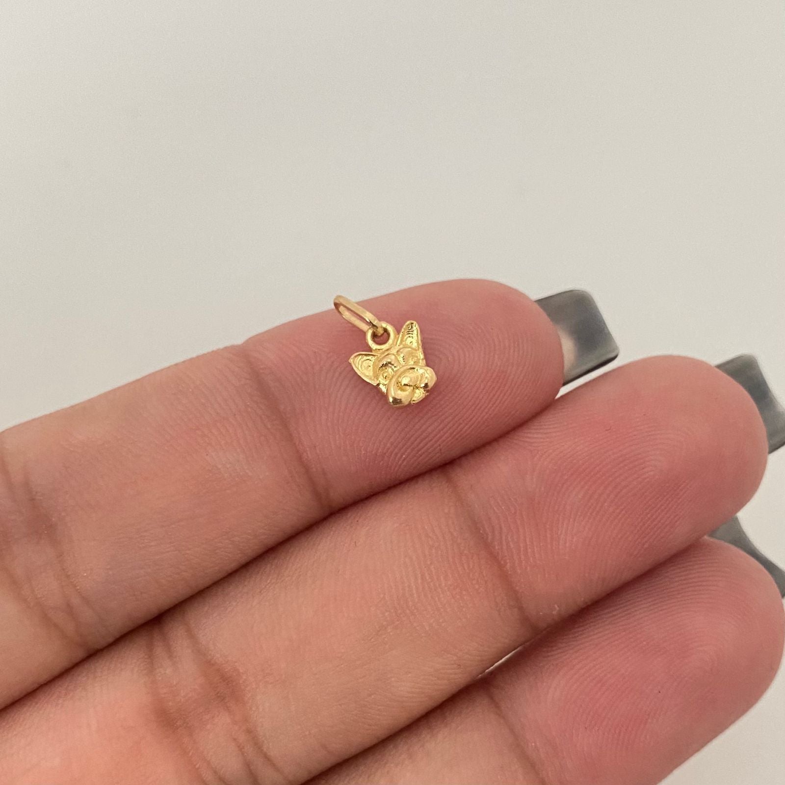 Dije rostro perrito Oro amarillo 18k 0,45 Gr / 1,0 Cm