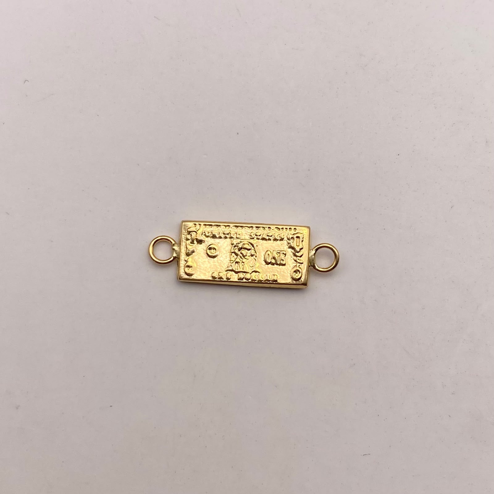 Herraje dolar Oro amarillo 18k 0,55 Gr / 2 Cm