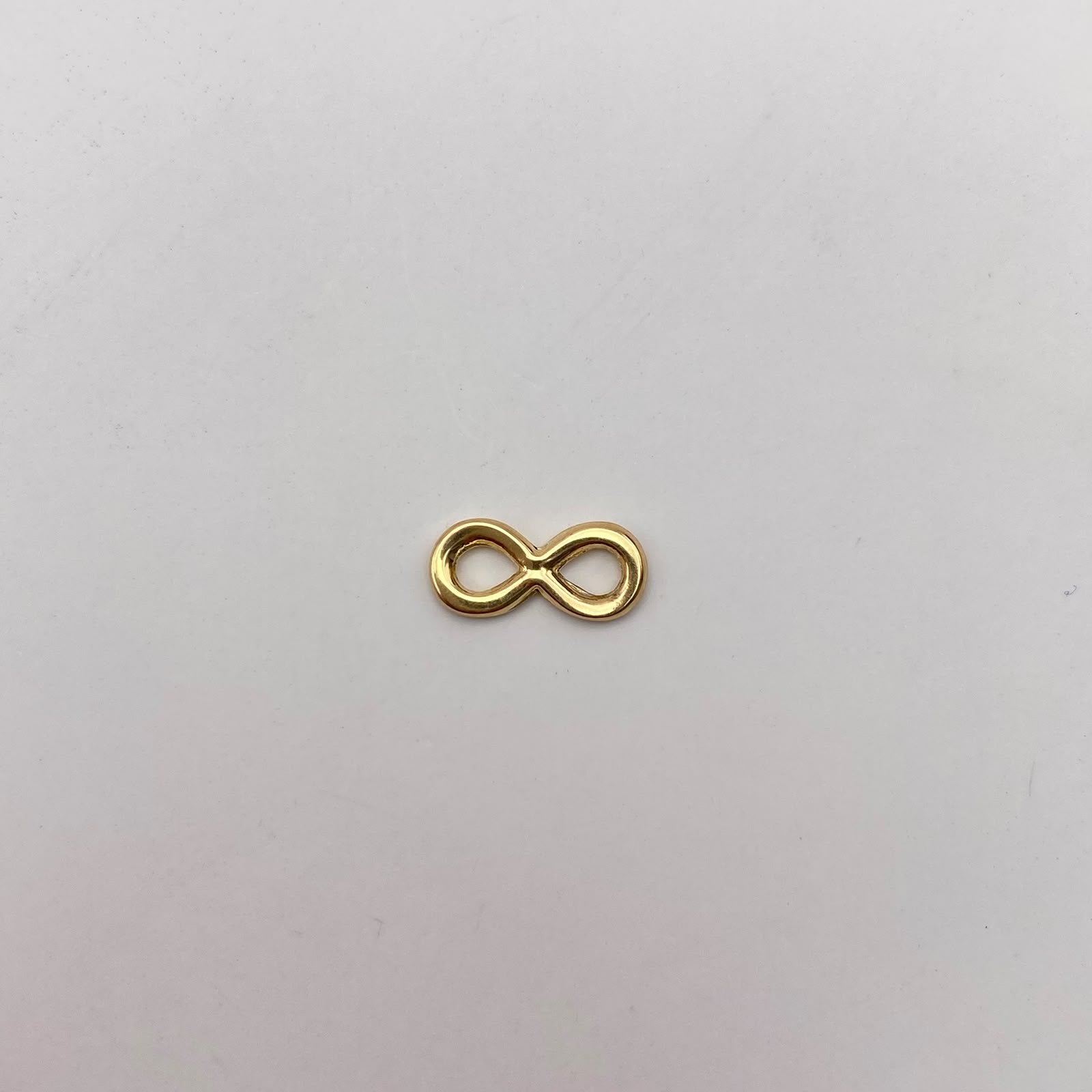 Herraje infinito Oro amarillo 18k 0,45 Gr / 1,5 Cm