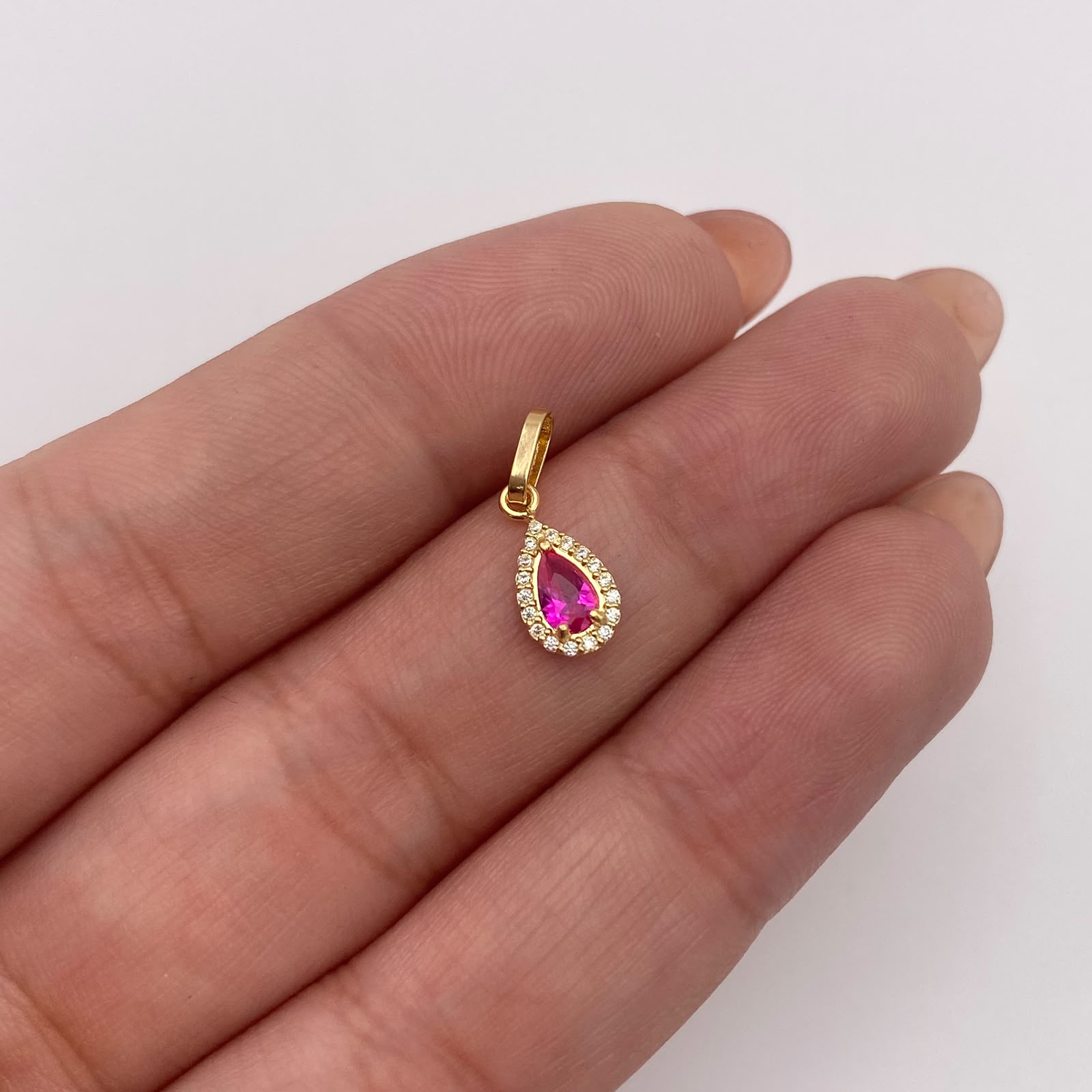 Dije Gota circon fucsia y blancos Oro amarillo 18k 0,4 Gr / 5,5 mm / 1,5 Cm