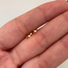 Topos mini estrella lisa Oro amarillo 18k 0,4 Gr / 2,5 mm
