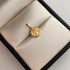Dije San benito Oro amarillo 18k 0,4 Gr / 8,4 mm / 1,5 Cm