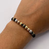 Pulsera tejida Bolas diamantadas 6mm con neoro tres rayas  Tres oros 18k 0,70 Gr