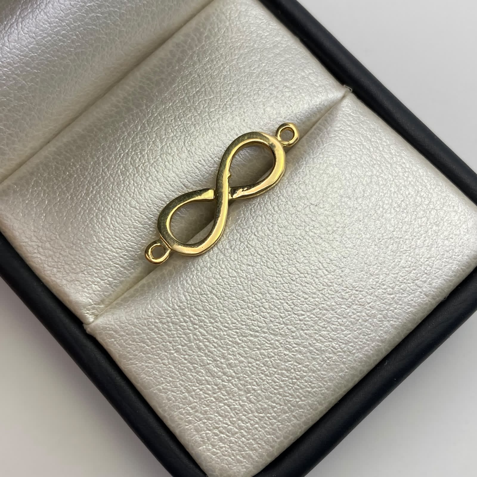Herraje Infinito liso Oro amarillo 18k 1,05 Gr / 2,4 Cm