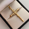 Dije Cruz Tubular Cristo Oro amarillo 18k 1,4 Gr / 24,6 mm / 4,4 Cm