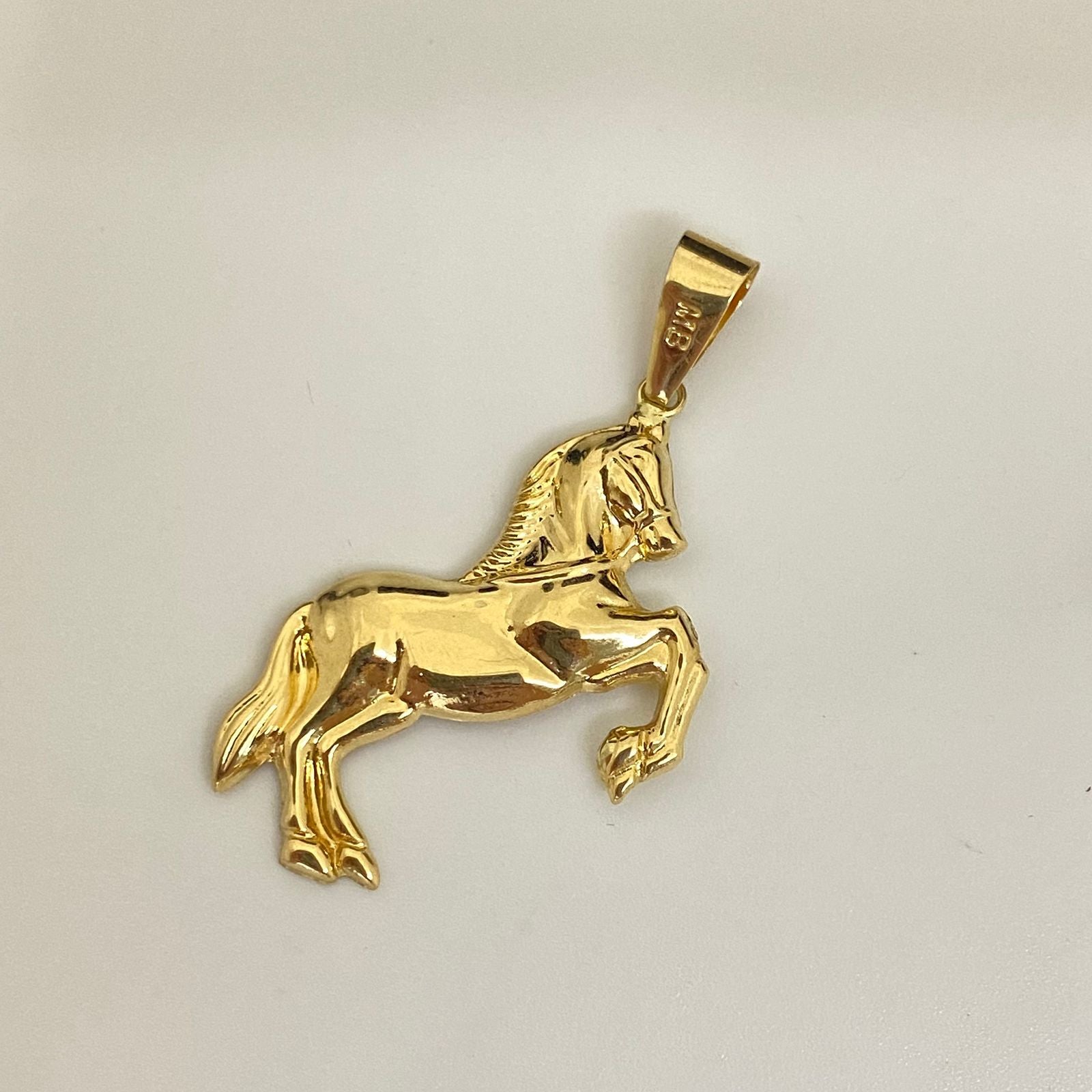 Dije caballo Oro amarillo 18k 2,1 Gr / 4,0 Cm