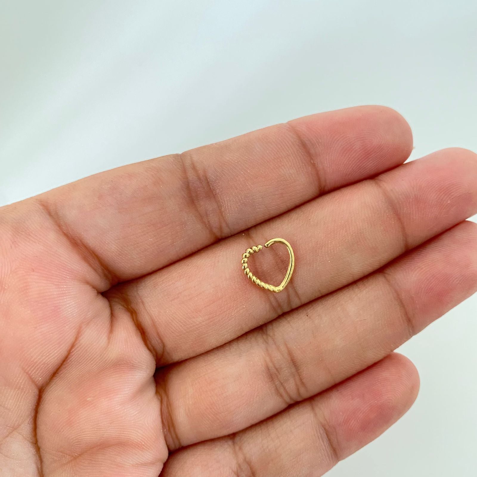 Piercing silueta corazon entorchado y liso ( joya ) Oro amarillo 18k 0,3 Gr
